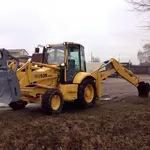 Komatsu WB93R2 Utility 2001 г в экскаватор-погрузчик