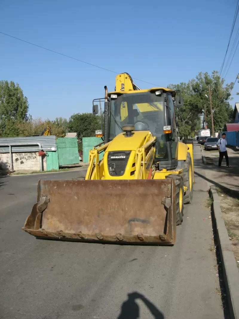 Экскаватор-погрузчик 4