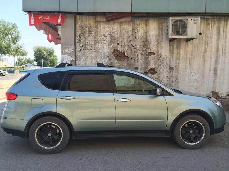 куплю грузовой  Ноwo 20 тн или меняю на Subaru tribeka  2005 г.в 4