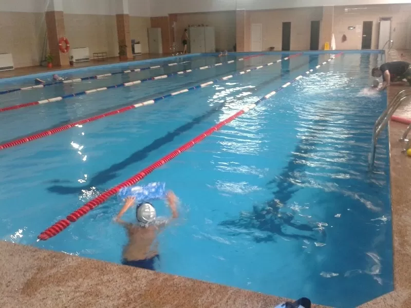 Обучение плаванию.