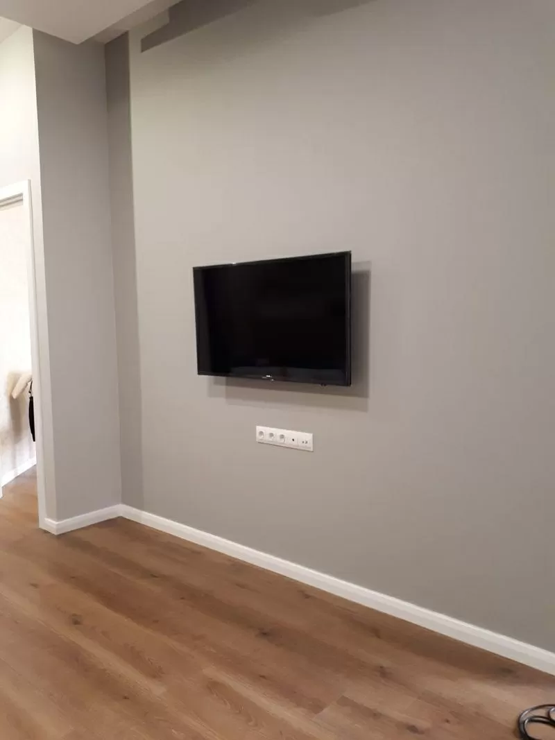 Навеска телевизоров на стену